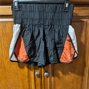 FP Movement by Free People Black, White, and Burnt Orange Shorts